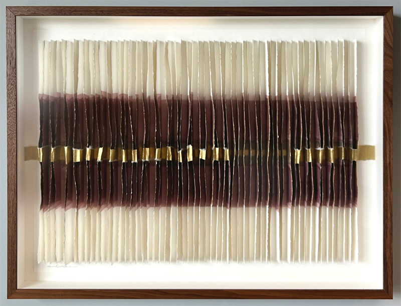 A dark red and cream artwork