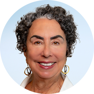 A woman with short curly hair